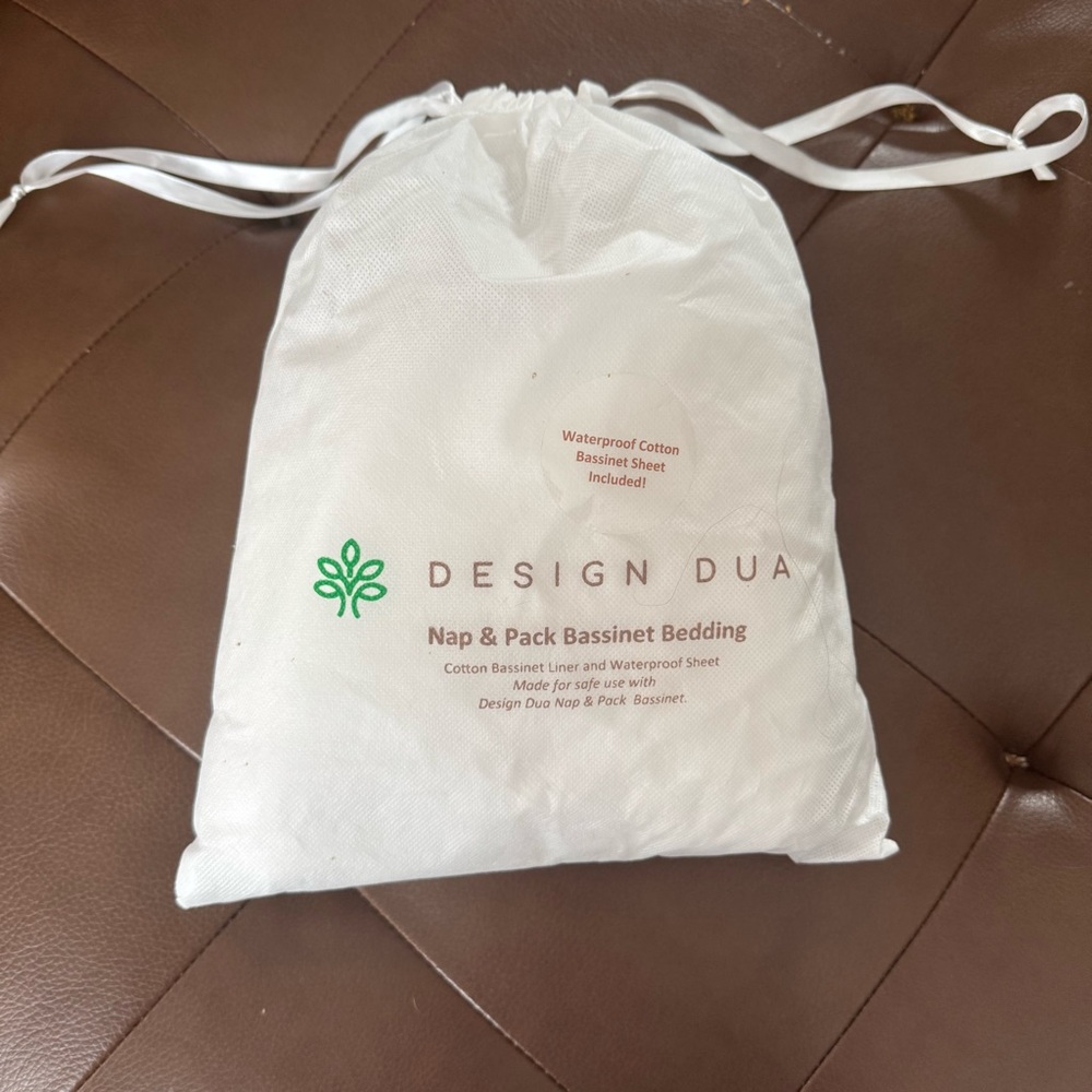 Design DUA nap and pack bassinet bedding